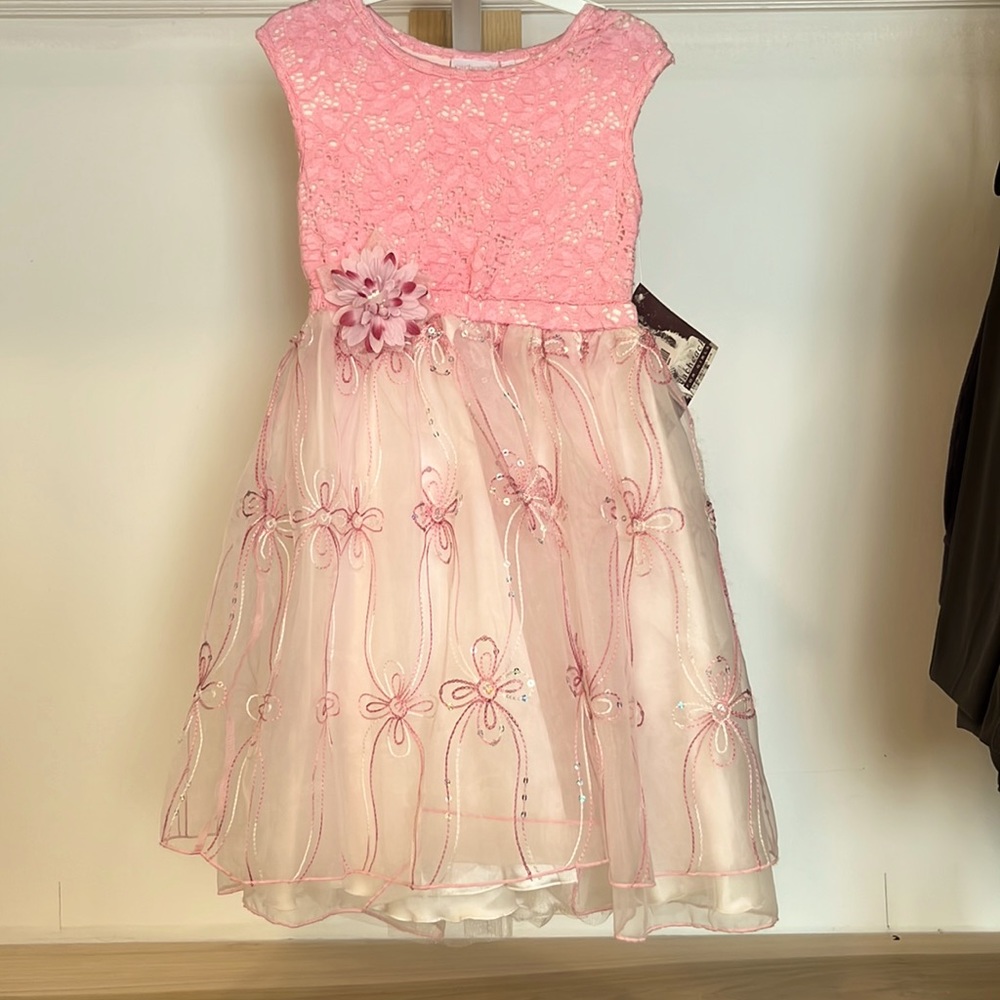 Little girls dress size 6x. New with tags. Beautiful!